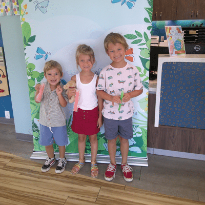 Gut health in kids 3 Three kids posing for a photo at commonwealth pediatrics, representing how to improve gut health in kids